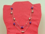 Dlouhý náhrdelník s fialovými a stříbrnými kuličkami